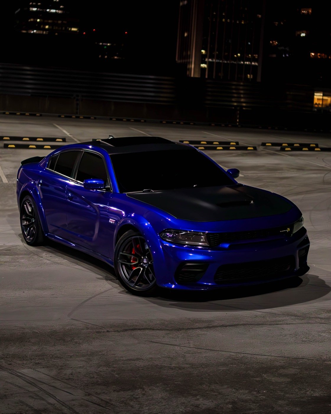 Dodge Charger Scat Pack with ceramic window tint at night